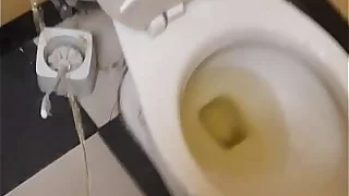 Public bathroom flooded with my piss